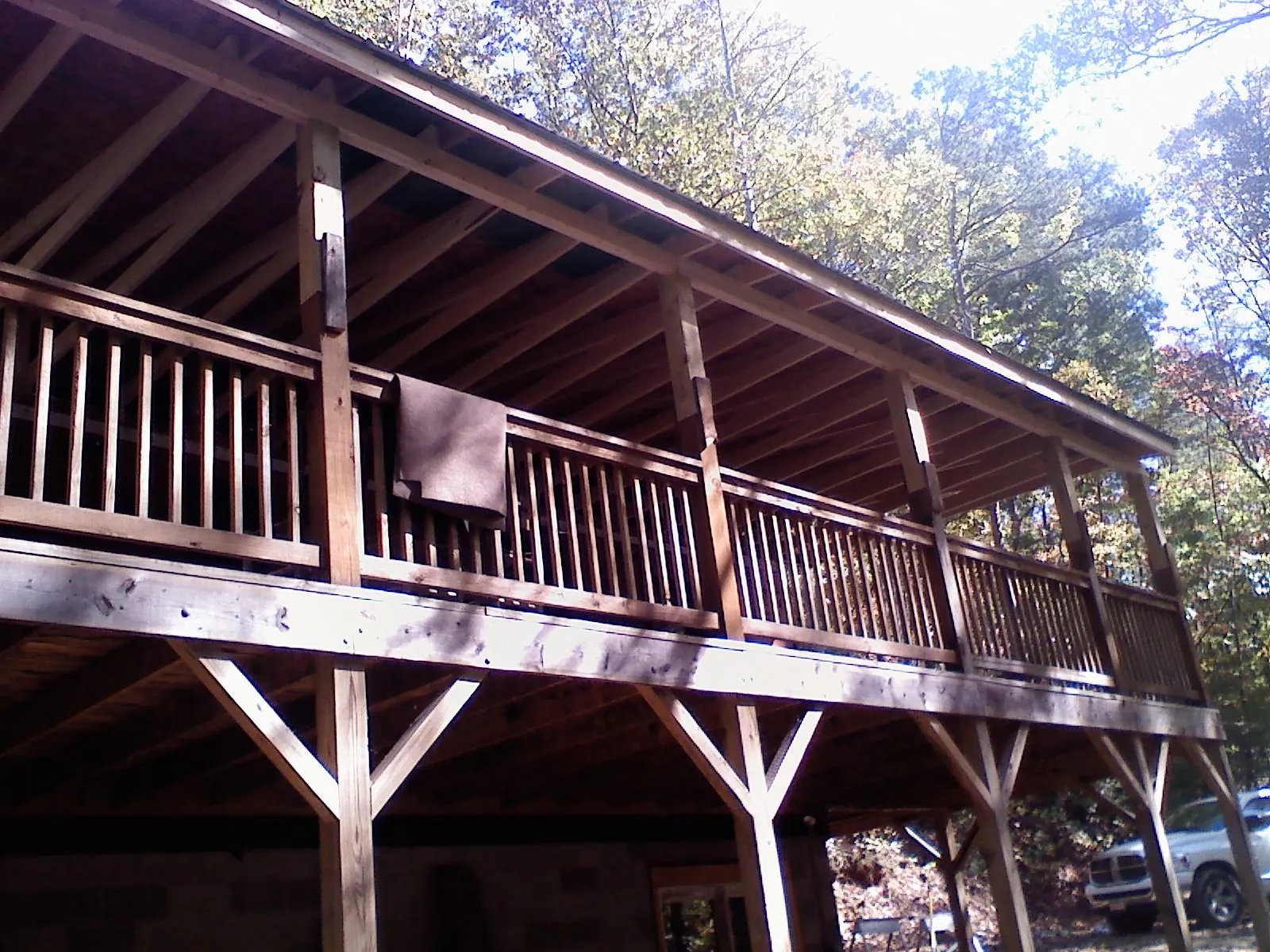 Timber framing under a new elevated porch and deck — Roof Leak Repair in Waynoka by Roofing Brothers